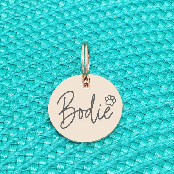 Rose Gold Personalised Dog Tag, Saxon Paw Print Design (Personalised Dog Tag / Personalised Cat Tag)
