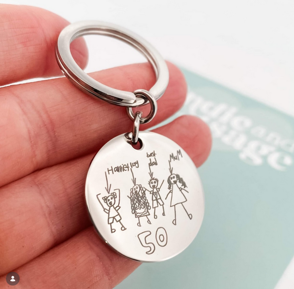 Personalised kids drawing keychain engraved with a child’s artwork and family illustration