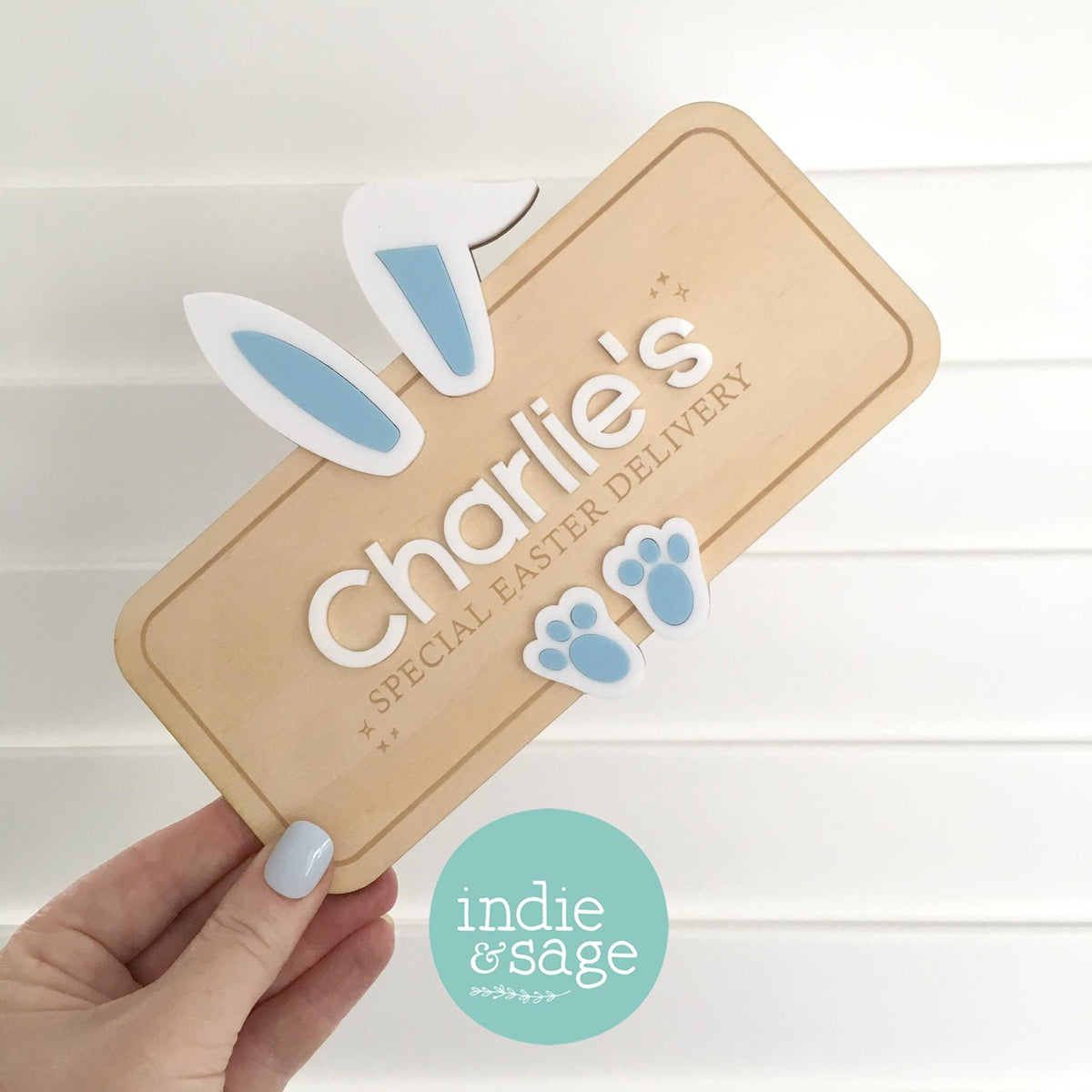 Personalised Easter crate sign made from plywood and acrylic, featuring bunny ears and a custom child’s name. Handmade in Adelaide Hills, this Easter box plaque reads “Special Easter Delivery” and is designed to attach to a wooden crate for Easter morning surprises.

#FirstEaster
#BabyFirstEaster
#PersonalisedEasterGift
#CustomEasterSign
#EasterGiftForKids
#EasterKeepsake
#EasterCrateSign
#EasterBasketIdeas
#HandmadeEasterGift
#UniqueEasterGift
#EasterGiftAustralia
#Easter2026
