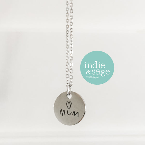 Personalised handwriting necklace engraved with child’s writing on round pendant