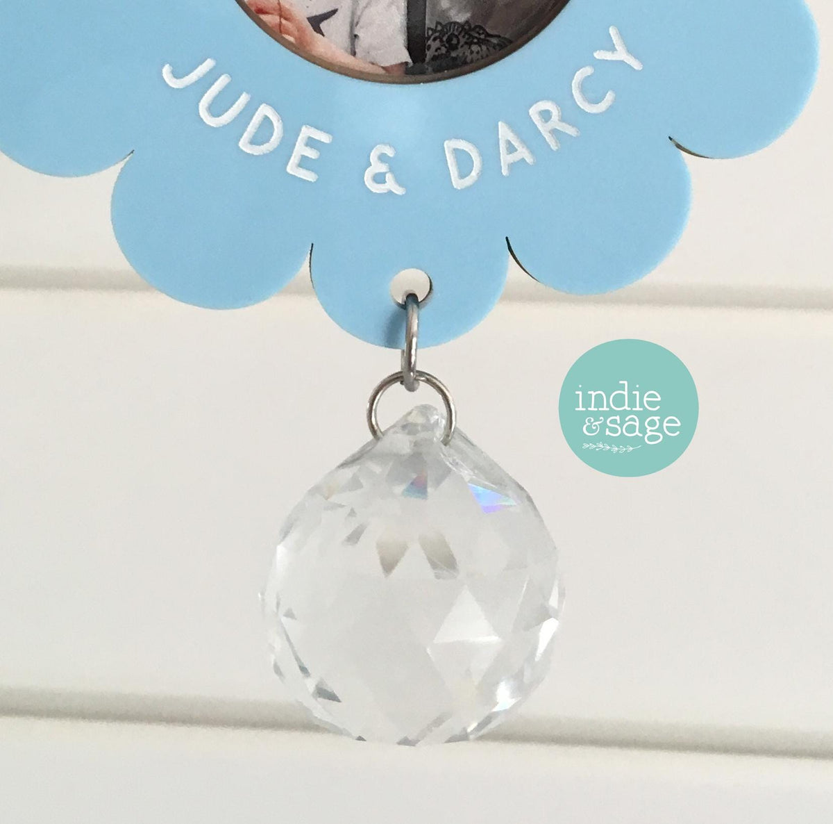 Custom Grandma favourite blooms wall hanging with photo flowers and crystal suncatcher reflecting rainbow light on white background