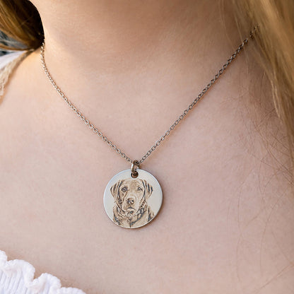 Personalised pet portrait necklace worn around the neck featuring a custom laser engraved dog portrait on a polished stainless steel pendant. A thoughtful personalised pet memorial gift handmade in Australia.