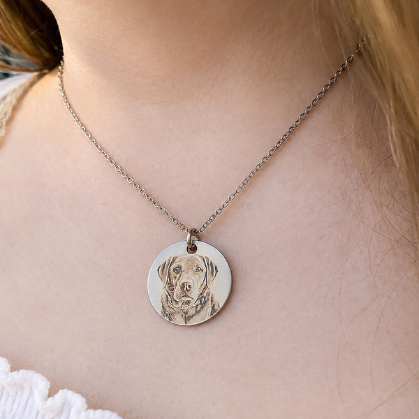 Personalised pet portrait necklace worn around the neck featuring a custom laser engraved dog portrait on a polished stainless steel pendant. A thoughtful personalised pet memorial gift handmade in Australia.