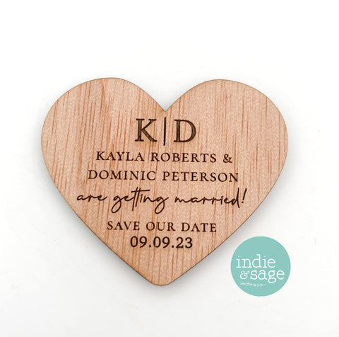 Laser engraved personalised wooden heart shaped save the date magnets